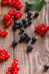 Currants and blueberries on the table. Summer berry.
