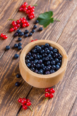 Currants and blueberries on the table. Summer berry.