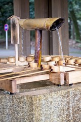 Wooden Dipper use to purify the body before visiting a shrine to worship ,that call in Japanese temizuya.
