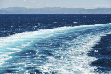 view of the sea after the sailing of a ship