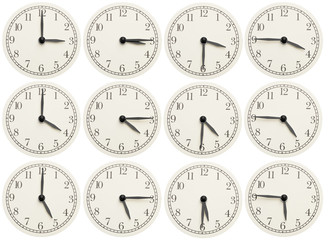 Set of office clocks showing various time isolated on white background