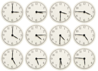 Set of office clocks showing various time isolated on white background