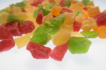 bright colorful candied fruits on a white background