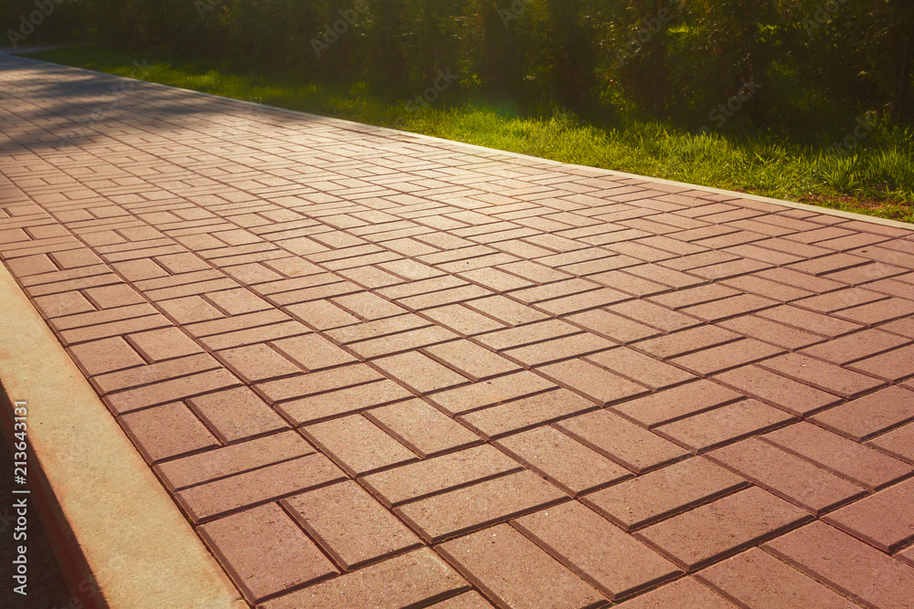 Wall mural red cobblestone footpath