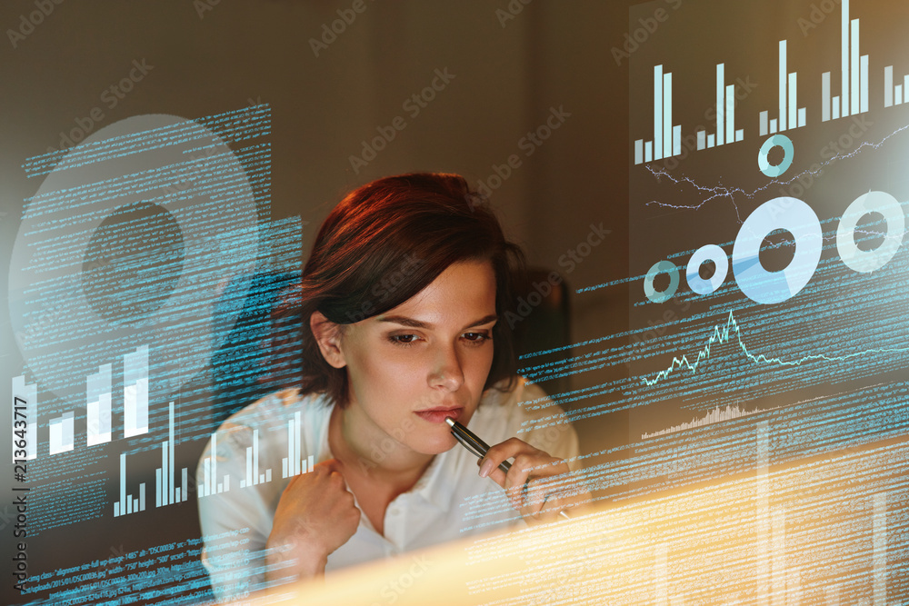 Leinwandbilder female programmer working with hologram display