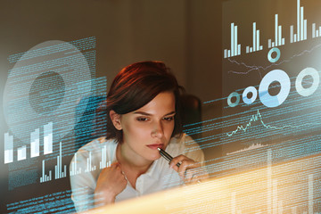 Female Programmer Working With Hologram Display