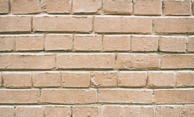 A wall against the background of an old red brick. Background