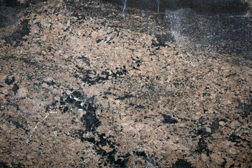 Multicolored natural stone texture, smooth granite surface, may be used as background 