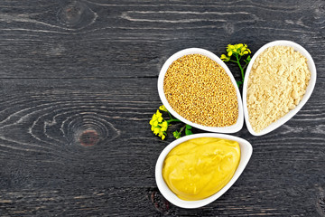 Mustard different in bowls with flower on board