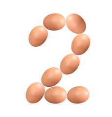 Number two made of Easter Eggs isolated on white background.Chicken eggs number 2 isolated on white background..