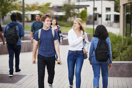 High School Students Socializing Outside College Buildings