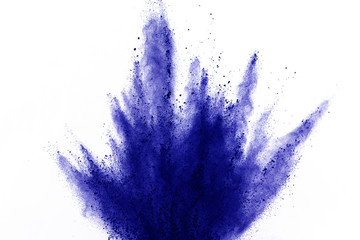 Abstract blue powder explosion on white background. abstract blue dust splatted on white...