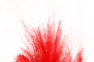 Abstract red powder explosion on white background. abstract red dust splatted on white background,...