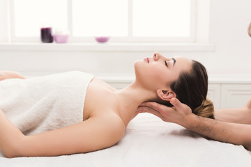 Obraz na płótnie Canvas Woman getting classical back and neck massage