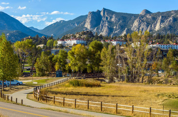 Estes Park - An autumn afternoon at Downtown Estes Park, with The Stanley Hotel and Rocky Mountains in background. Colorado, USA.
