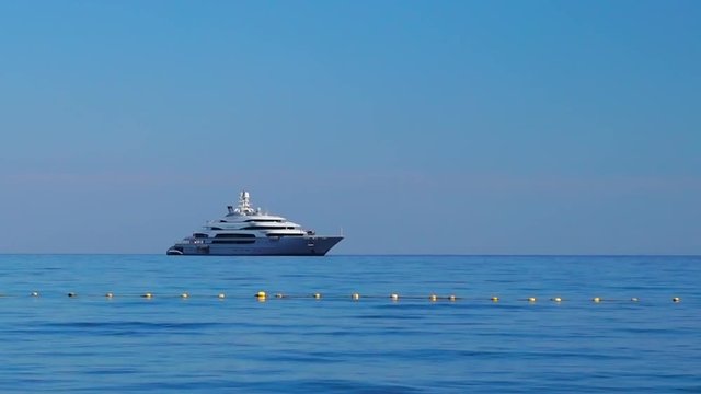 Luxury mega private yacht sailing in sea
