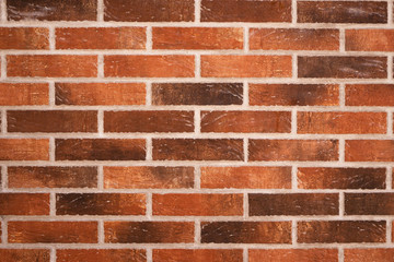 Texture of red brickwall with shabby structure. Outdoor wall.