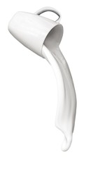 Milk Spilling Out Of A Cup