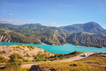 Fototapeta premium .An automobile road along the mountain lake Serre-poncon. Provence. France.