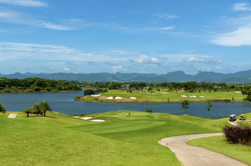 Golf course with a rich green turf beautiful scenery.