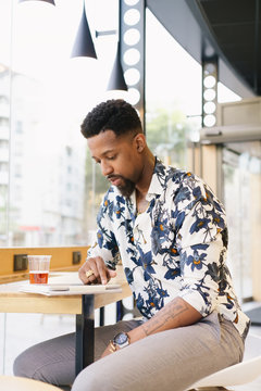 Man reading from tablet