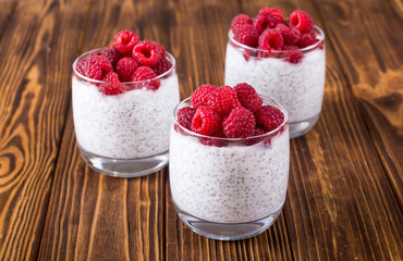 Chia pudding in glass with raspberry