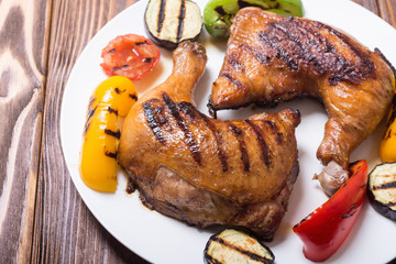 Grilled chicken legs with vegetables