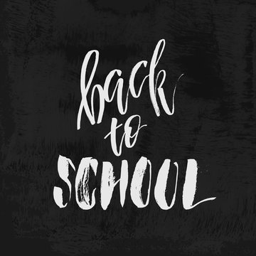 Welcome Back to School chalk lettering on blackboard. Vintage Calligraphic Design Label On Chalkboard. Vector Logo