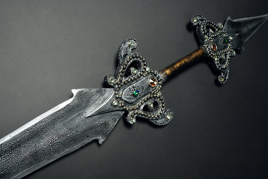 Metal sword on background ,close up