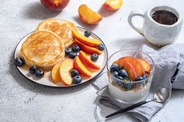 granola and yogurt with fresh berries