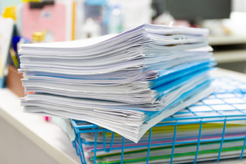 file folder and Stack of business report paper file on the table in a work office, concept document in work office