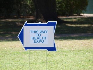 Health Expo Sign draws attention from major highway by proper placement to follow easily from busy roadway..