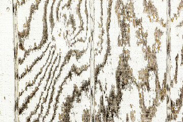 Faded white-washed wood showing the grain.