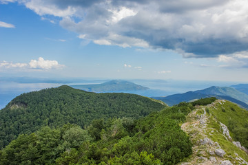 Fototapeta na wymiar national park nature concept of sea waterfront forest mountain landscape from ridge