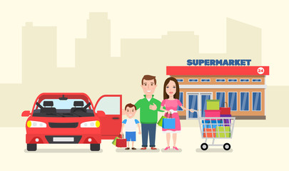 Fototapeta na wymiar family standing near car with shopping cart from supermarket