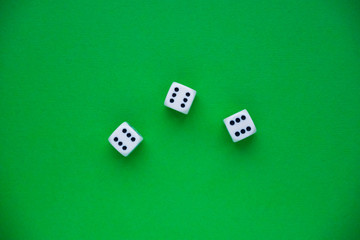 dice on a green background