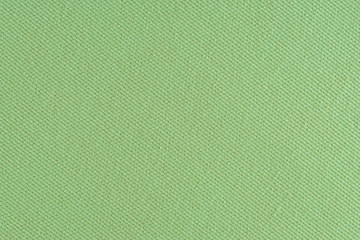 Green fabric texture background.