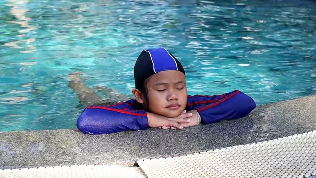 Thai children in swimming pool 