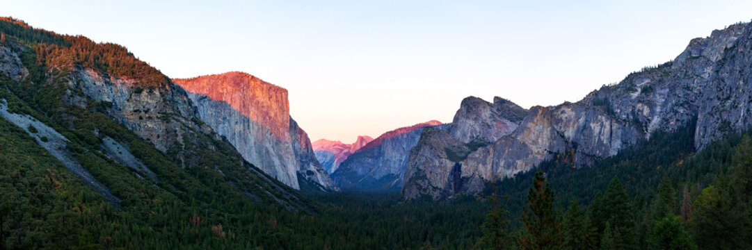 Yosemite valley nation park during sunset view from tunnel view on twilight time. Yosemite nation park, California, USA. Panoramic image.