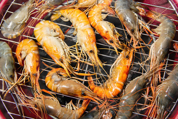Thai recipes seafood Grilled river shrimps fresh on the stove.