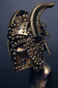 Mannequin in copper horn helmet 