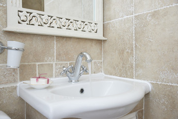 Bathroom with sink basin faucet
