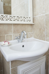 Bathroom with sink basin faucet