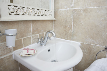 Bathroom with sink basin faucet