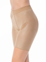 Compression pull beige panties on the body of a woman