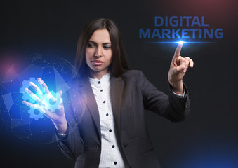 The concept of business, technology, the Internet and the network. A young entrepreneur working on a virtual screen of the future and sees the inscription: Digital Marketing