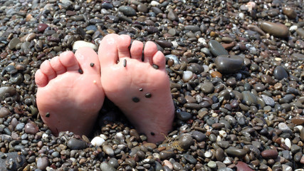 feet on the beach