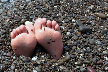 feet on the beach