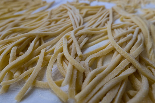homemade spaghetti, also known as "torchi" or "troccoli"