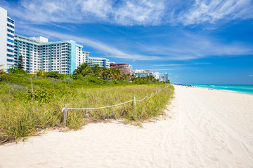 Scenic Miami Beach on a sunny day with condos and resort hotels.